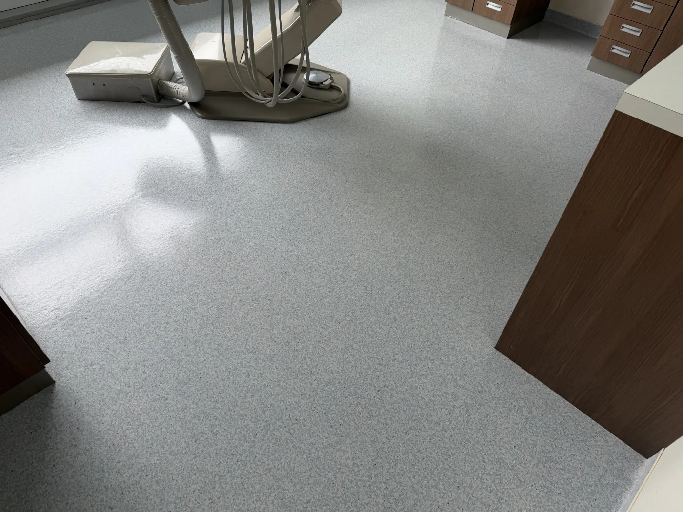 Commercial equipment cleaning a hard floor